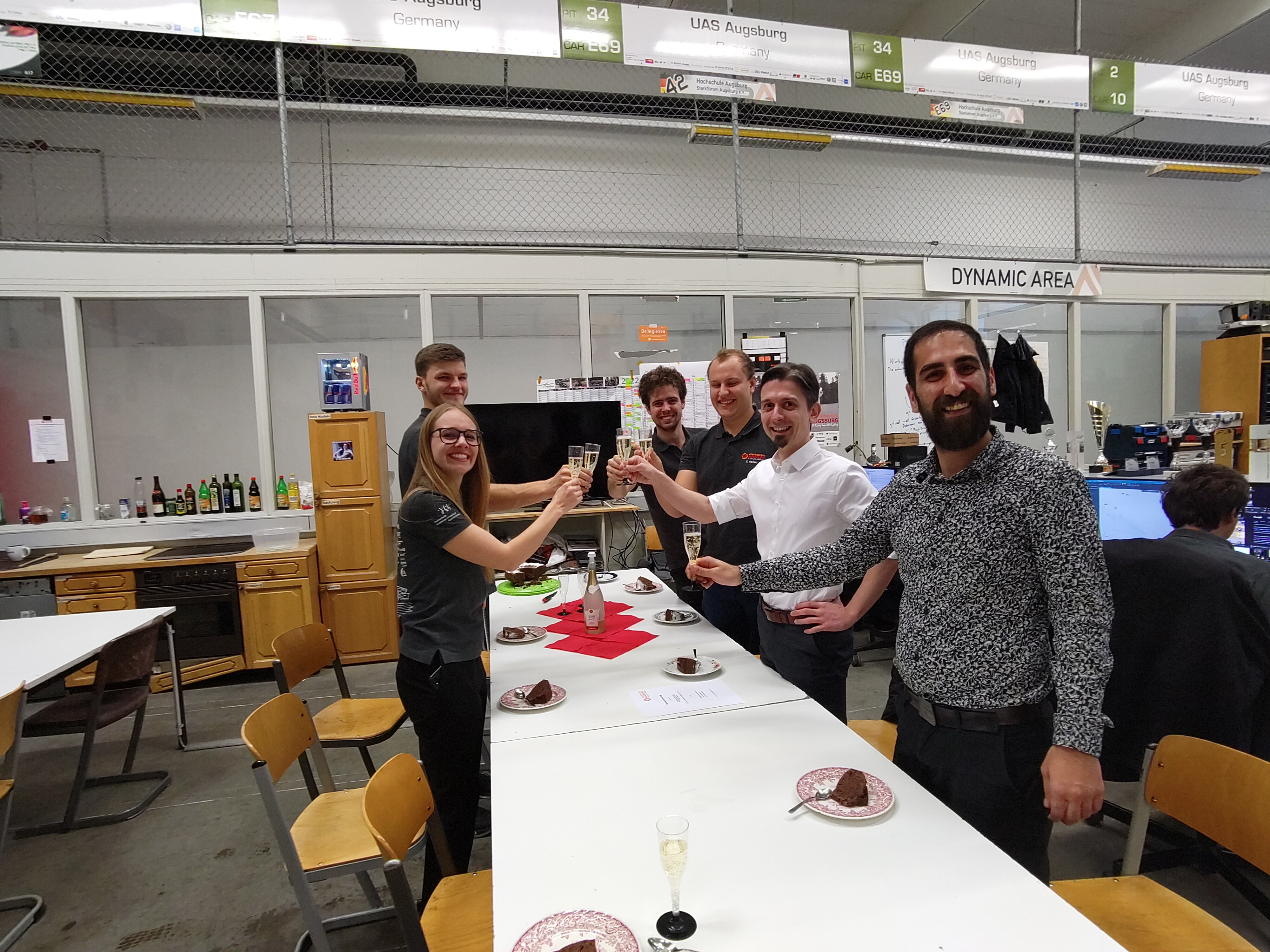 Team StarkStrom made a toast with TUXEDO Computers and non-alcoholic sparkling wine.