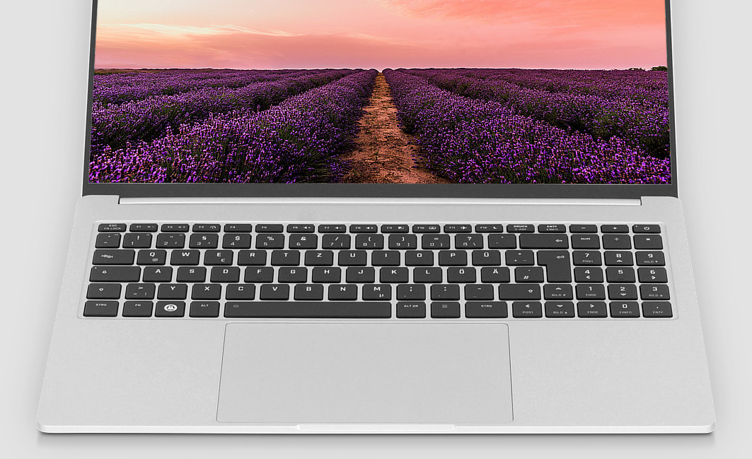 The low-profile keyboard is illuminated in white. The glass clickpad can be individually configured if required.